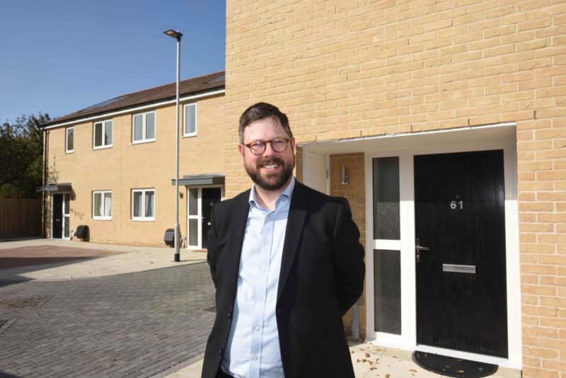 Cllr Richard Johnson outside new Petersfield housing develpment